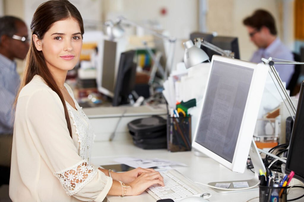Retail leasing consultant reviewing lease documents at a Melbourne office desk